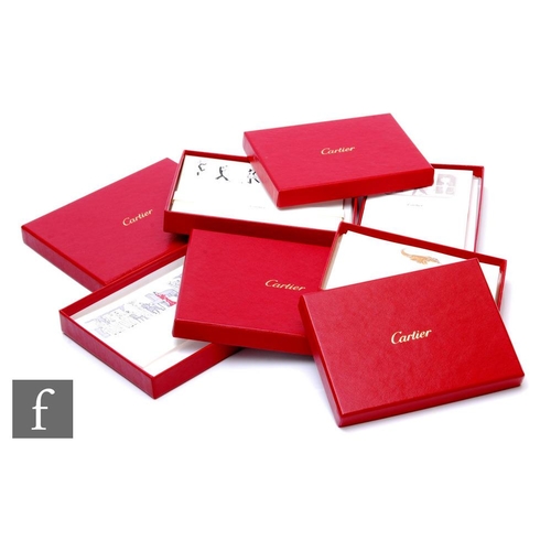 710 - A collection of boxed Cartier stationery sets, box one including ten notecards and envelopes, box tw... 