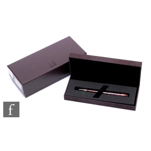 714 - A Dunhill boxed 'Sidecar' tortoiseshell finish ballpoint pen, with original booklet, box, refill.PLE... 