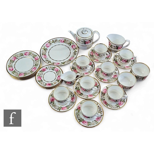 238 - AMENDED DESCRIPTION A 20th Century Royal Worcester tea service in the Royal Garden pattern, comprisi... 