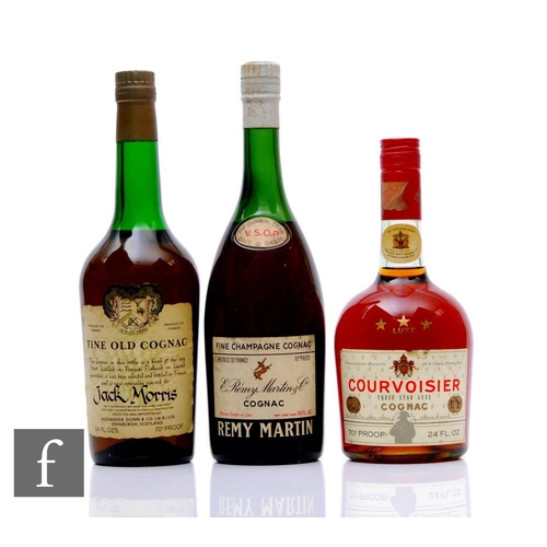 540 - A collection of 1950s/60s cognacs, to include a bottle of Remy Martin white label, a bottle of Courv... 