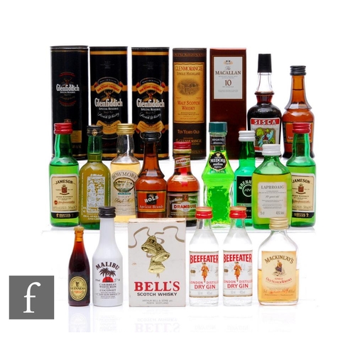 547 - A collection of whisky and spirit miniatures, including eleven Irish and Scottish whiskies, gin, and... 