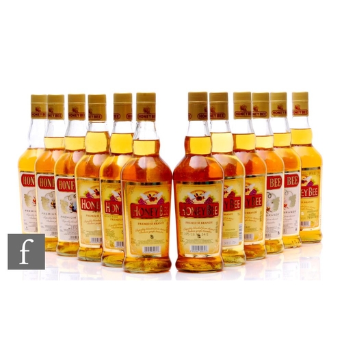 554 - Twelve bottles of Goan Honey Bee Brandy, all 70cl.PLEASE VIEW CONDITION REPORT