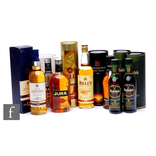 584 - A collection of Scottish single malt and blended whiskies, all with original tubes/boxes, to include... 