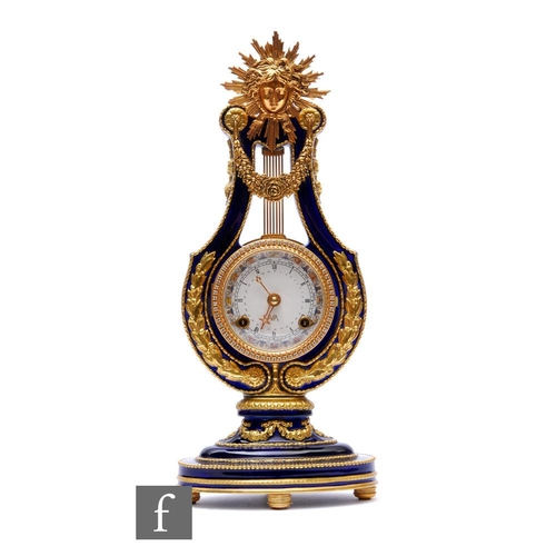 751 - A 20th Century French porcelain lyre shaped mantle clock 'Marie-Antoinette', striking on a bell, ova... 