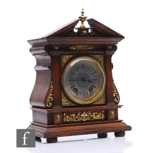 756 - An Edwardian oak cased mantle clock, applied brass decoration, eight day Lenzkirch striking movement... 