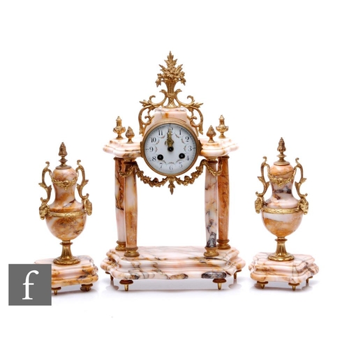 761 - A 20th Century French clock garniture, the enamel dial suspended between four pillars surmounted wit... 