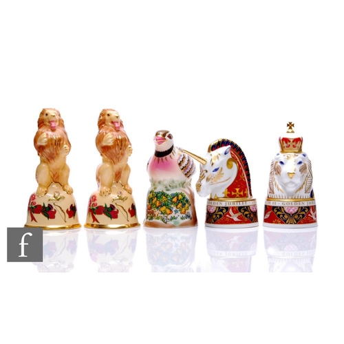 77 - A collection of later 20th Century Royal Worcester candle snuffers, comprising the Lion and the Unic... 