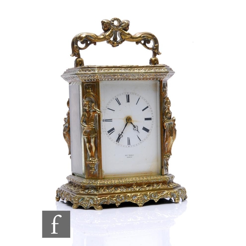 773 - A French gilt metal carriage clock, decorated with four figurative studies in relief to each corner ... 