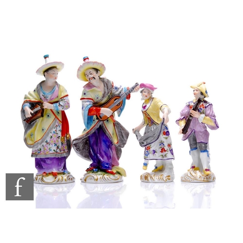 211 - A collection of continental porcelain figures, to include a pair of Chinese Musicians figures, heigh... 