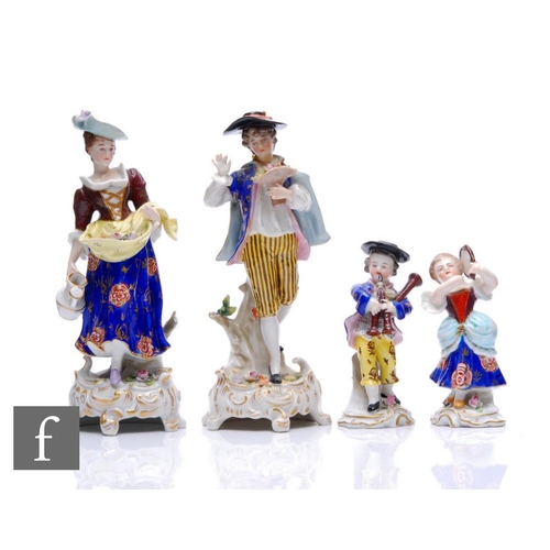 216 - A collection of 19th Century continental figures, including a pair of Samson/Derby figures, modelled... 