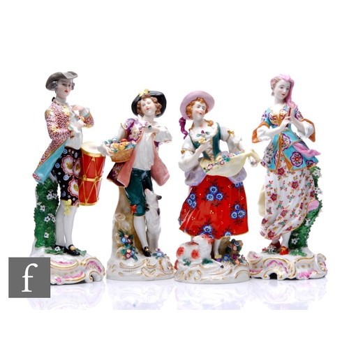 245 - A collection of early 20th Century Continental hard paste porcelain figures modelled in period dress... 