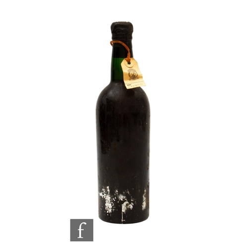 571 - A bottle of 1963 vintage port, lacking label and capsule degraded, possibly Fonseca's, old Christies... 