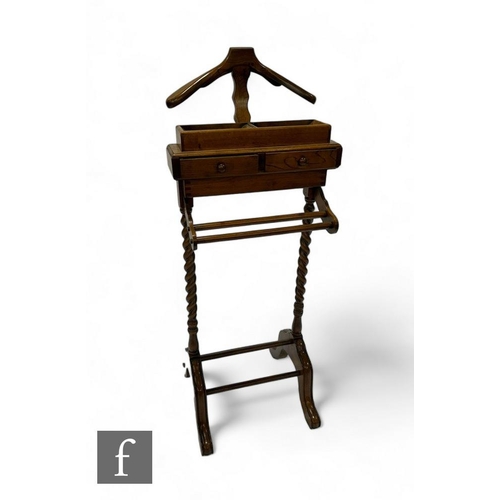 781 - A Victorian style oak valet stand, fitted with two drawers, on spiral splayed end supports, height 1... 