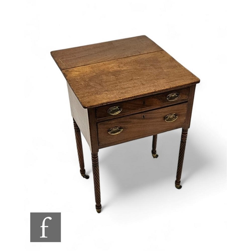 790 - A 19th Century small two drawer work table with side drop flap, oval brass drop handles, on ring tur... 