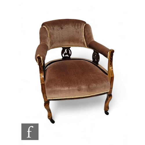 796 - An Edwardian walnut easy chair, pierced back on cabriole legs, upholstered in pale pink plush.PLEASE... 