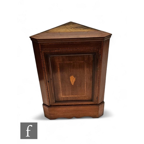 848 - An Edwardian corner cupboard base section inlaid with a shell patera, on bracket plinth, height 87cm... 