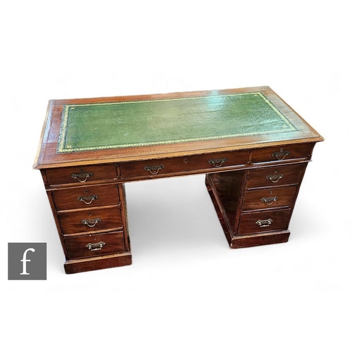 860 - A late Victorian mahogany kneehole desk fitted with three frieze drawers and three drawers to each p... 