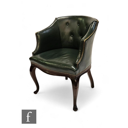 861 - A late 19th to early 20th Century library chair by Howard & Son Ltd London, upholstered in brass... 