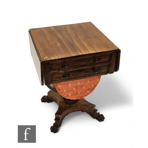 879 - A mid 19th Century mahogany drop flap work table, fitted with two drawers, turned wood handles, over... 