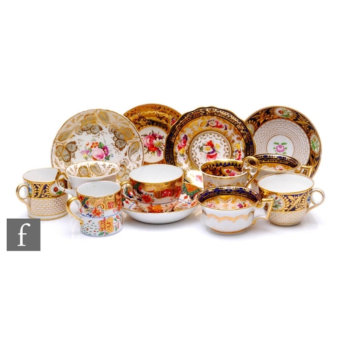 88 - A collection of 19th Century tea wares, including a Sevres style trio decorated with a band of flora... 