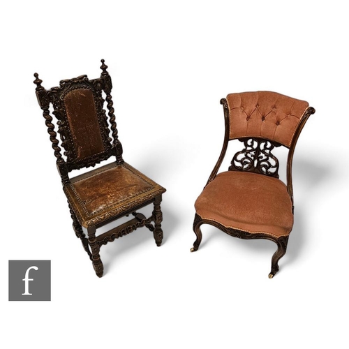 893 - A Victorian carved walnut nursing chair, scroll button back on turned legs, upholstered in pink plus... 