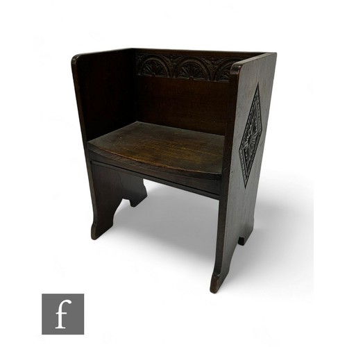 812 - A small 1930s carved oak hall seat, the lunette decorated back over a bow front on lozenge 'V' cut e... 