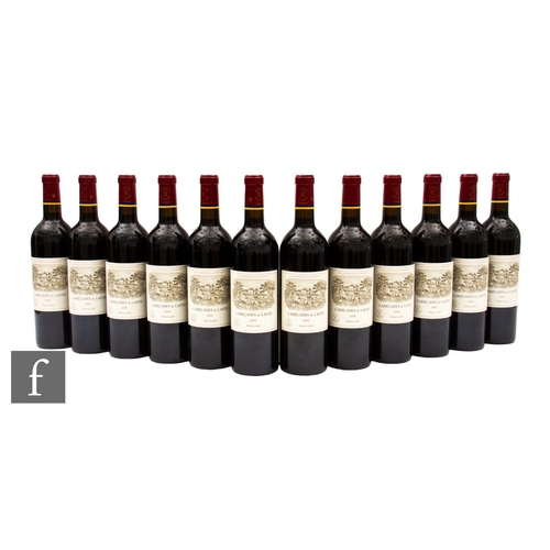 653 - Twelve bottles of 2009 Carruades de Lafite, Pauillac. (12)PLEASE VIEW CONDITION REPORT