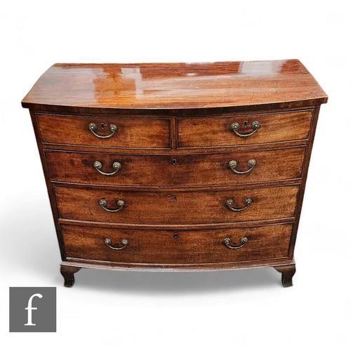 808 - A George III mahogany bow front chest of two short and three long drawers, brass swan neck handles, ... 