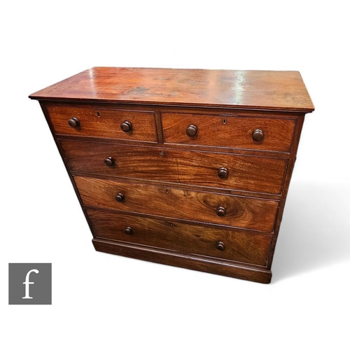 832 - A mid 19th Century straight front mahogany chest of two short and three long drawers, turned wood ha... 