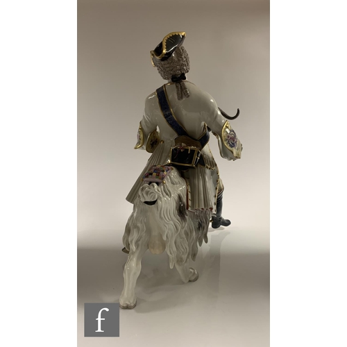 195 - A large 19th century Meissen porcelain figure of Count Brühl's Tailor on a goat, after the 18th Cent... 