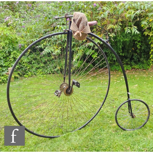 272 - A Penny Farthing by J Stassen makers London, leather saddle, black painted frame, large wheel 55 1/2... 