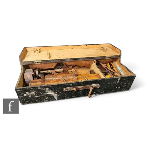 863 - A Victorian pine tool chest containing moulding planes, mortise and tenons, spokes shaves and other ... 