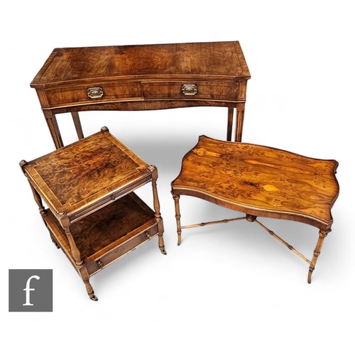 867 - A George III style yew wood concave side table fitted with two drawers, on square tapering legs, hei... 