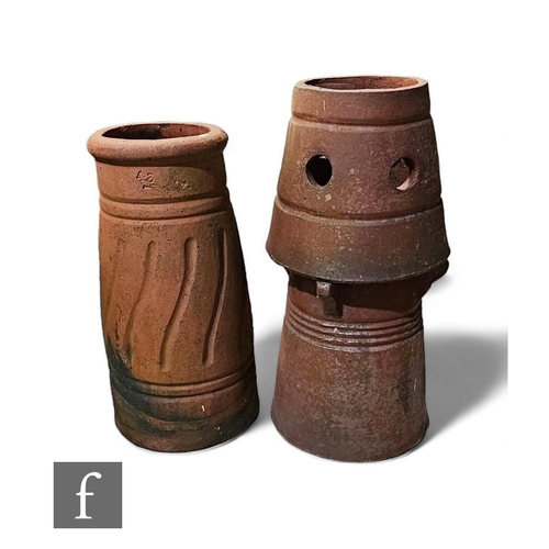 896 - A red terracotta cone shaped chimney pot, height 71cm, and a similar smaller example with spiral det... 