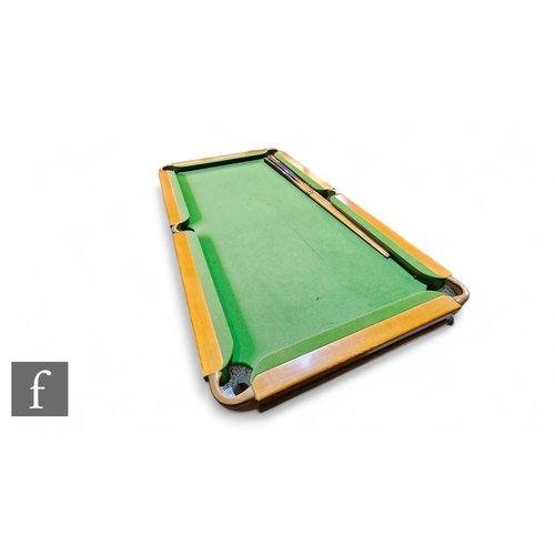 822 - A 20th Century 'Riley' style slate bed quarter size billiard table, green baize and wooden frame, on... 