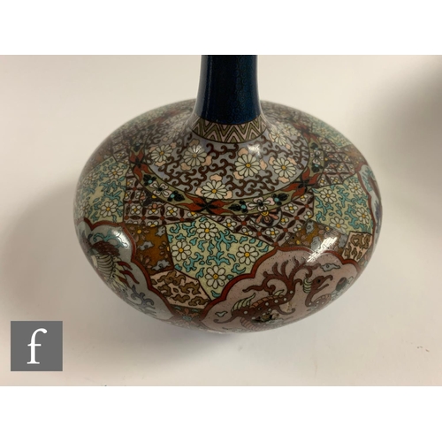 29 - An early 20th Century Japanese cloisonne bottle vase, the bulbous body rising to a slender neck, dec... 