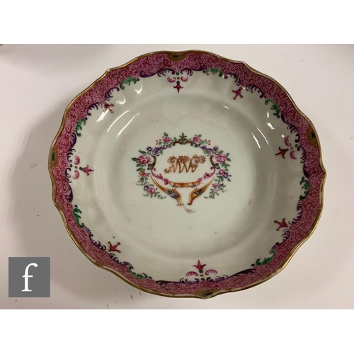 37 - Two Chinese 18th Century export porcelain famille rose teabowls and saucers, the first enamelled in ... 