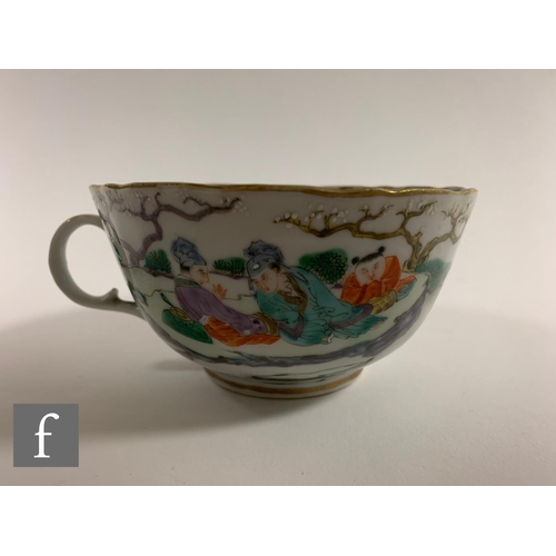 55 - A Chinese Daoguang period teacup, of U form with scalloped rim and loop handle, decorated with figur... 