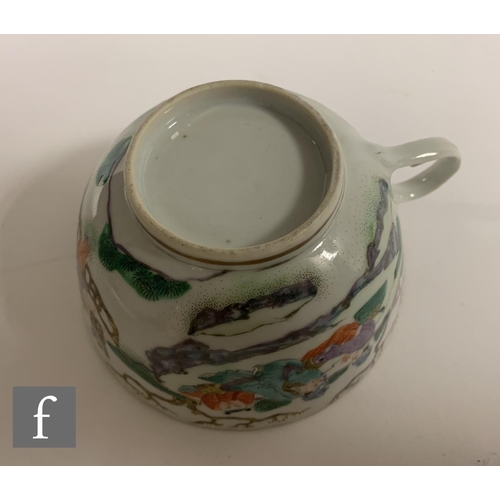 55 - A Chinese Daoguang period teacup, of U form with scalloped rim and loop handle, decorated with figur... 