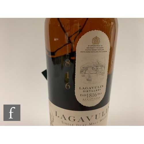 615 - A bottle of Lagavulin 16 years aged single malt whisky, 1990s bottling, 70cl.PLEASE VIEW CONDITION R... 