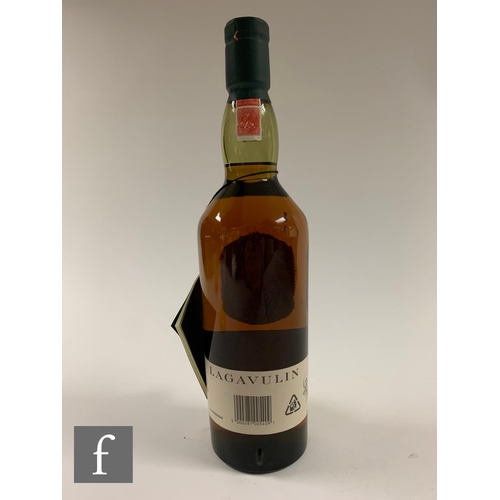 615 - A bottle of Lagavulin 16 years aged single malt whisky, 1990s bottling, 70cl.PLEASE VIEW CONDITION R... 