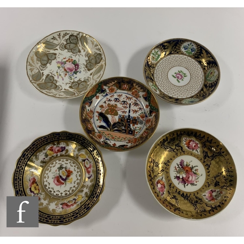 88 - A collection of 19th Century tea wares, including a Sevres style trio decorated with a band of flora... 