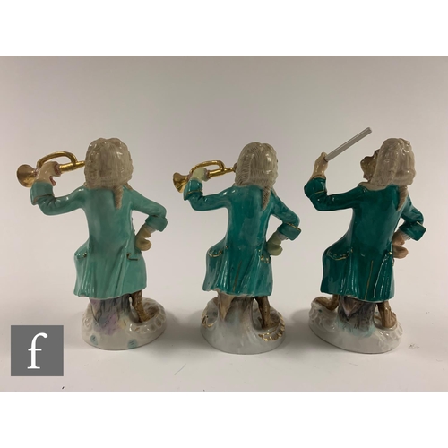 199 - A sixteen piece early 20th Century Meissen and further German porcelain monkey band group, to includ... 