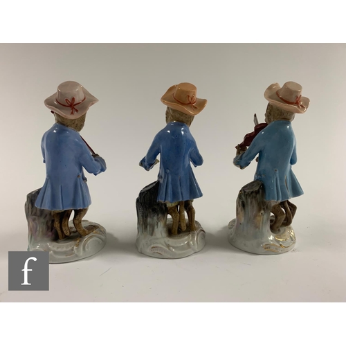 199 - A sixteen piece early 20th Century Meissen and further German porcelain monkey band group, to includ... 