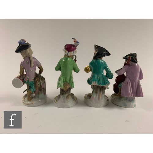 199 - A sixteen piece early 20th Century Meissen and further German porcelain monkey band group, to includ... 