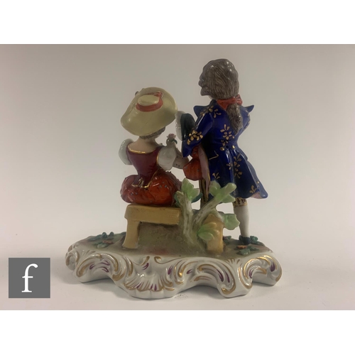 147 - A collection of 19th Century figures, including a Meissen figure of a grape picker, modelled as a ch... 