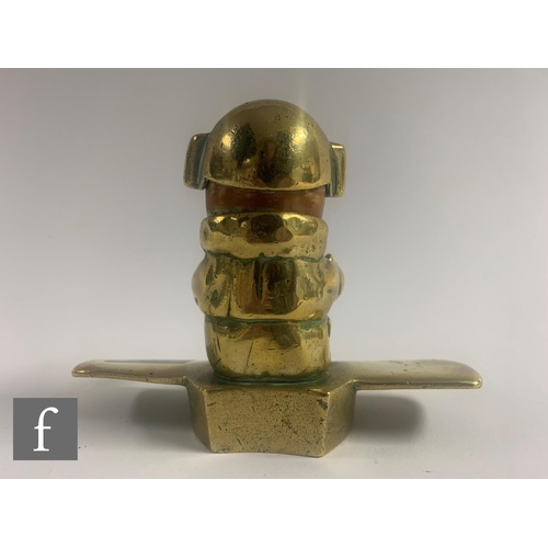 270 - A brass car mascot by John Hassall (1868-1948), modelled as an aviator, lacking propeller and sticks... 