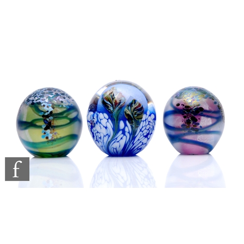 132 - Three contemporary Jonathan Harris studio glass paperweights, including two Monet weights, mottled i... 