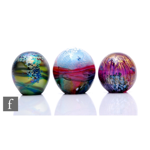 133 - Three contemporary Jonathan Harris studio glass paperweights, including a Monet glass weight with ir... 