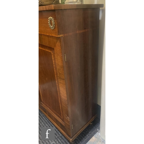 795 - A small 19th Century satinwood crossbanded chiffonier, the adjustable sliding shelves enclosed by a ... 